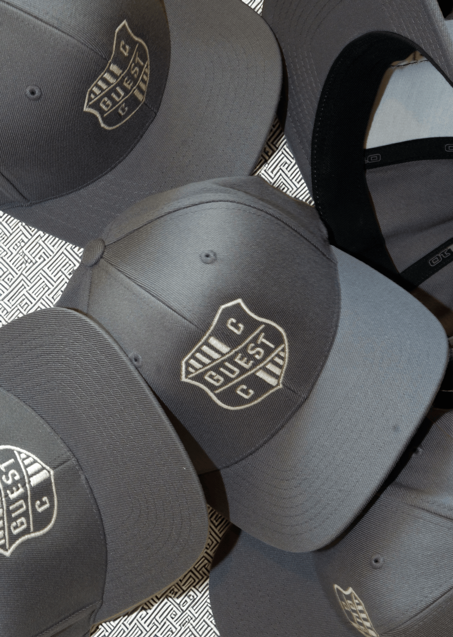 Grey Country Club Guest hats with embroidered crest logo